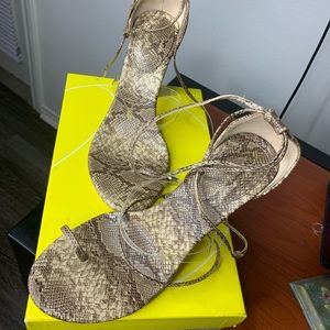 Snakeskin strappy heels.